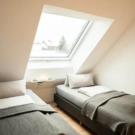 Апартаменты Gaestehaus Stoll - 3 Schlafzimmer, Nahe Flughafen & Messe Фильдерштадт